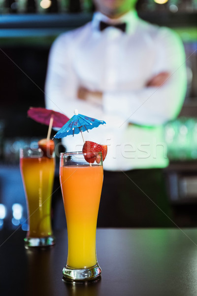 Two glasses of cocktail on bar counter Stock photo © wavebreak_media