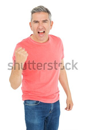 Opgewonden man vuist omhoog witte Stockfoto © wavebreak_media