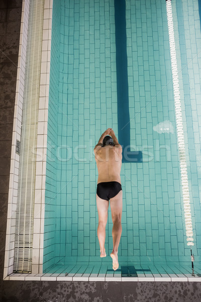 Swimmer diving into the pool Stock photo © wavebreak_media