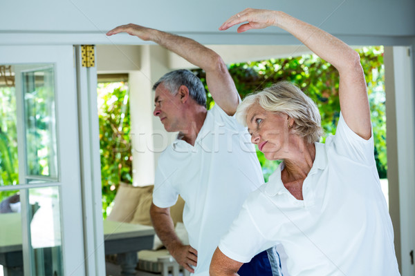 Couple de personnes âgées aérobic maison homme fitness supérieurs Photo stock © wavebreak_media