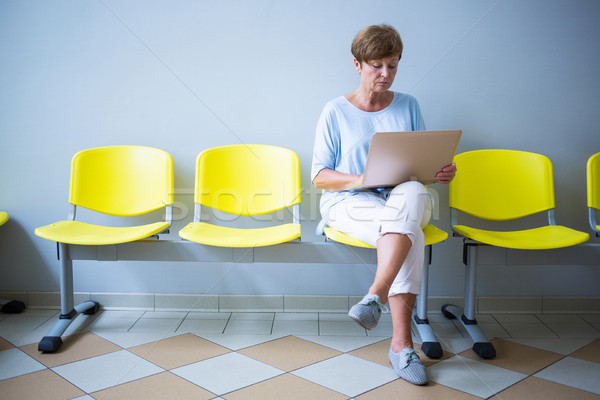 Patient sitting with report in a waiting room Stock photo © wavebreak_media