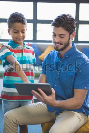 Paramedic training cardiopulmonary resuscitation to senior man and boy Stock photo © wavebreak_media
