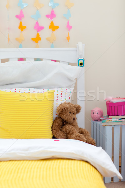 Child's bedroom with a teddy bear on the bed Stock photo © wavebreak_media