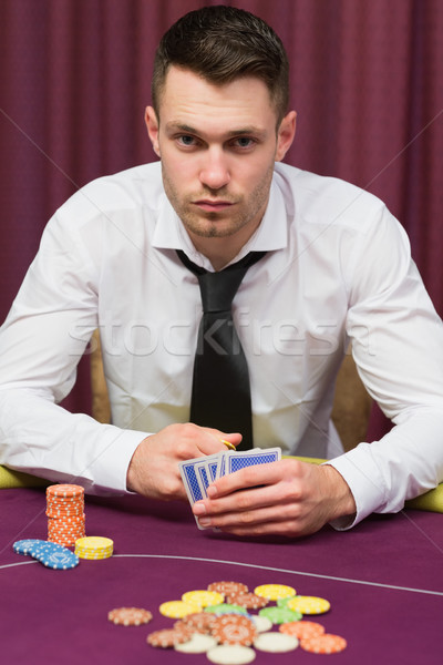 男子 坐在 撲克 表 賭場 手 商業照片 © wavebreak_media