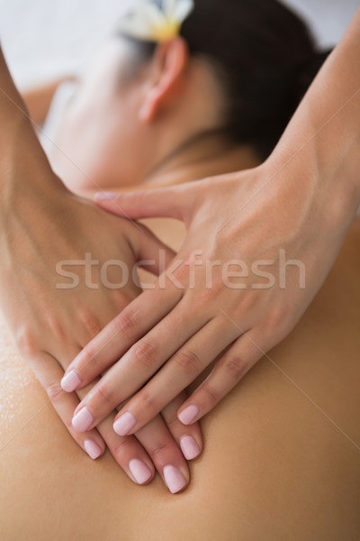 Brunette enjoying a back massage Stock photo © wavebreak_media