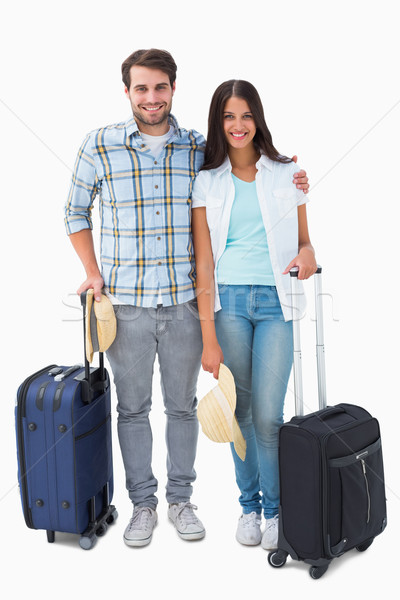 Attractive young couple going on their holidays Stock photo © wavebreak_media