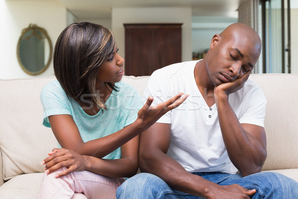 Unhappy couple having an argument on the couch Stock photo © wavebreak_media