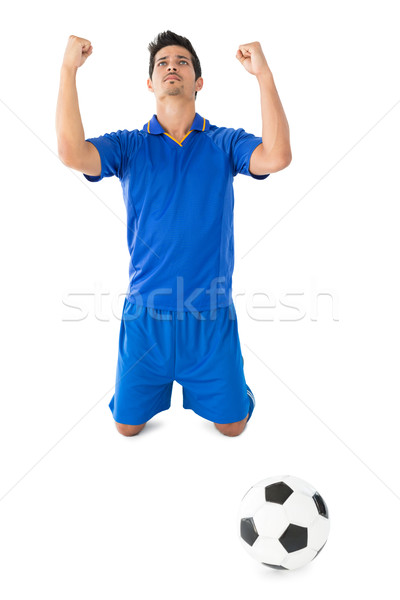 Sportos futballista éljenez fehér futball kék Stock fotó © wavebreak_media