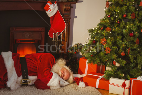 Дед Мороз ковер рождественская елка дома огня человека Сток-фото © wavebreak_media