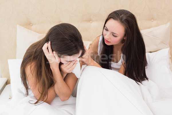 Brunette comforting her crying friend Stock photo © wavebreak_media