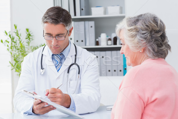 Doctor explaining prescriptions to senior woman Stock photo © wavebreak_media