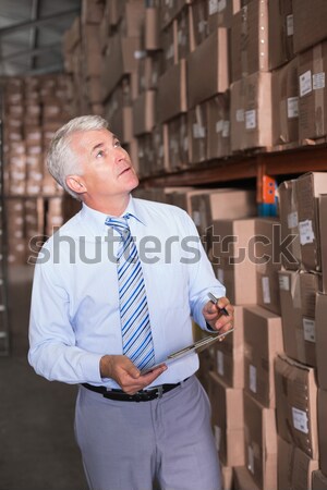 Manager halten Zwischenablage Halle Seitenansicht Mann Stock foto © wavebreak_media