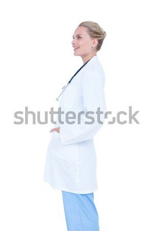 Pretty businesswoman with finger crossed  Stock photo © wavebreak_media