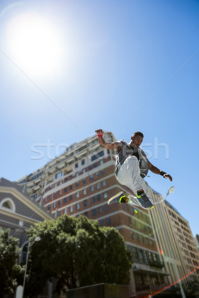 Athletic man doing parkour in the city Stock photo © wavebreak_media