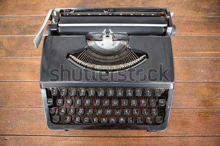 Composite image of man using writing machine Stock photo © wavebreak_media