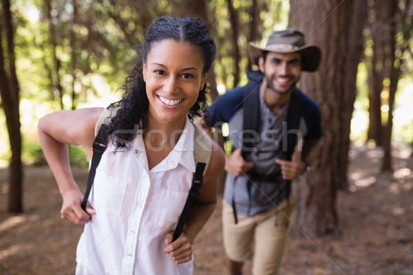 Portrait of happy couple hiking in forest Stock photo © wavebreak_media