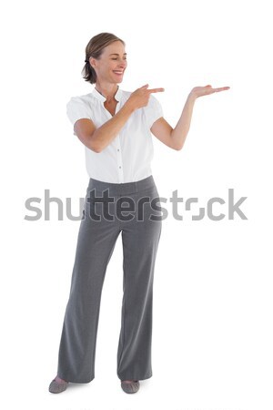 Stock photo: Businesswoman holding her fingers crossed