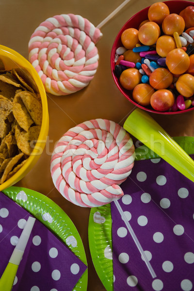 Confectioneries and decorated plates on a table Stock photo © wavebreak_media