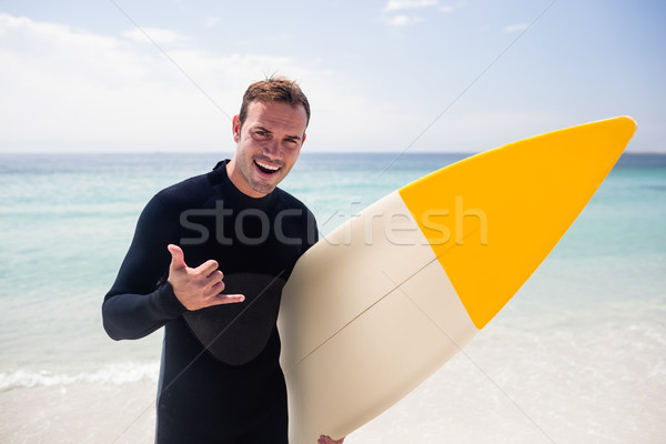 Surfista tabla de surf muestra de la mano playa retrato Foto stock © wavebreak_media