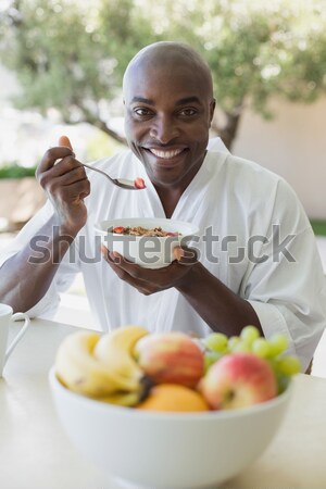 Senior couples removing seeds of apricot fruits in garden Stock photo © wavebreak_media