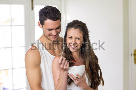 Stock photo: Smiling couple drinking coffee