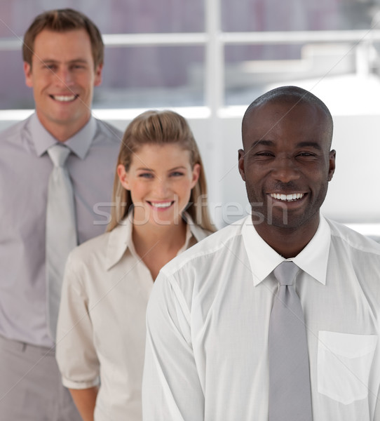 Smiling business team showing Spirit and expressing Positivity Stock photo © wavebreak_media