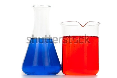 Blue and red beakers against a white background Stock photo © wavebreak_media