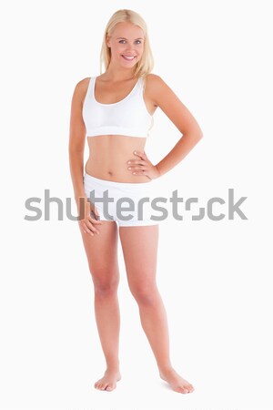 [[stock_photo]]: Jeune · femme · sous-vêtements · studio · sourire · heureux · mode