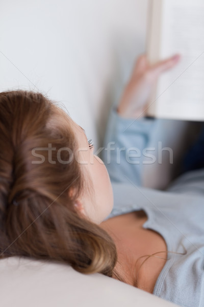 Shadowing young woman who is reading Stock photo © wavebreak_media