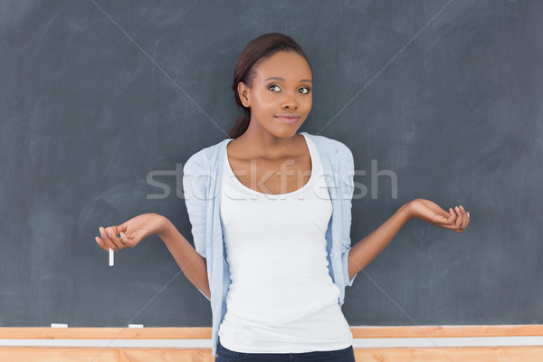 Black woman hesitating in a classroom Stock photo © wavebreak_media