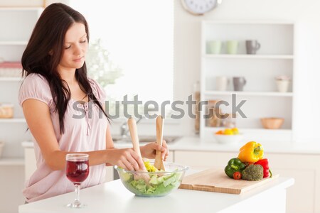Nő saláta konyha oldalnézet fiatal nő ház Stock fotó © wavebreak_media