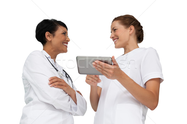 Two female doctors using digital tablet Stock photo © wavebreak_media