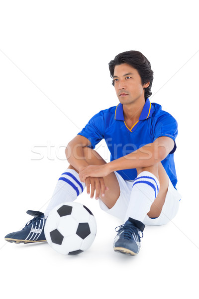 Futballista kék ül labda fehér férfi Stock fotó © wavebreak_media