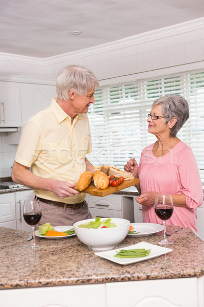 Senior couple preparing lunch together Stock photo © wavebreak_media