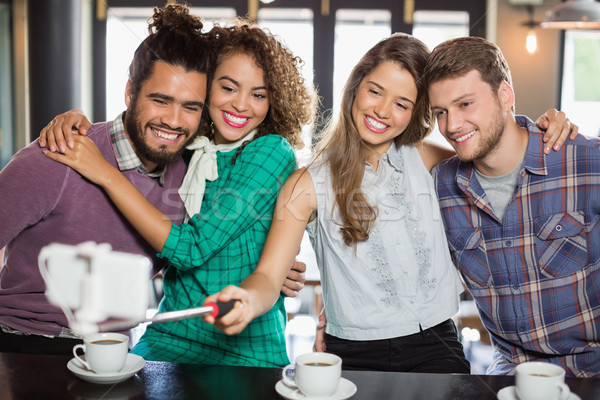 Friends taking selfie while enjoying in restaurant Stock photo © wavebreak_media