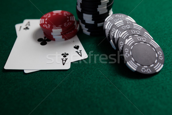 Cartes à jouer jetons de casino poker table casino noir [[stock_photo]] © wavebreak_media