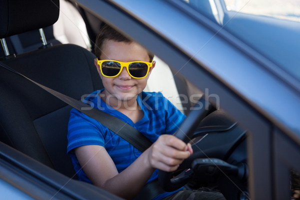 Conducere maşină zâmbitor copil călători Imagine de stoc © wavebreak_media