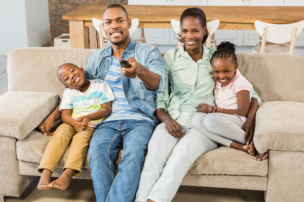 Boldog család megnyugtató kanapé nappali boldog otthon Stock fotó © wavebreak_media