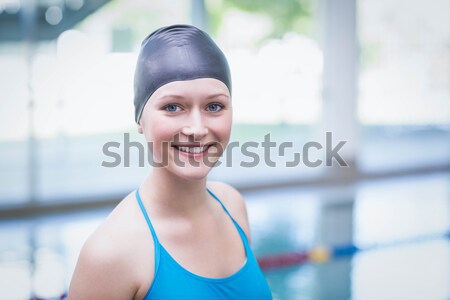 Pretty woman wearing swim cap  Stock photo © wavebreak_media