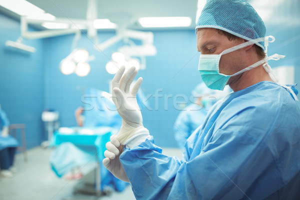 Foto stock: Masculino · cirurgião · cirúrgico · luvas · operação