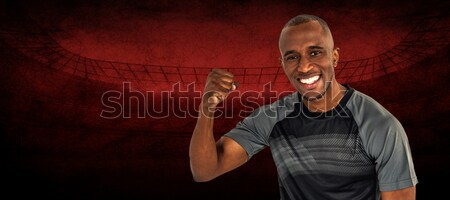 Composite image of excited rugby player pointing up Stock photo © wavebreak_media