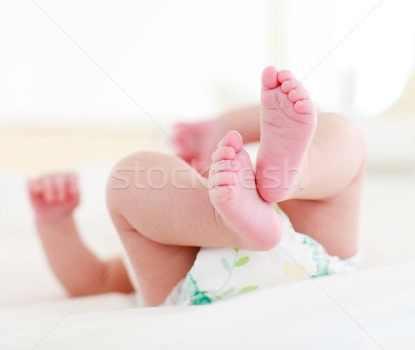 Peu bébé lit fils visage heureux [[stock_photo]] © wavebreak_media