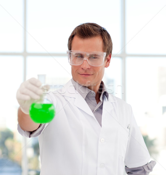 Young scientist examining a test-tube Stock photo © wavebreak_media