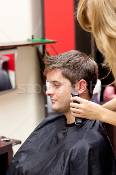 Jeunes homme salon main mode Photo stock © wavebreak_media