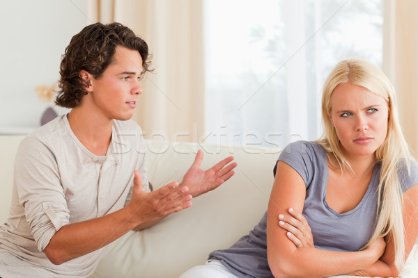 Couple having an argument in their living room Stock photo © wavebreak_media