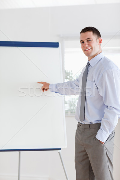 Smiling businessman giving a presentation Stock photo © wavebreak_media