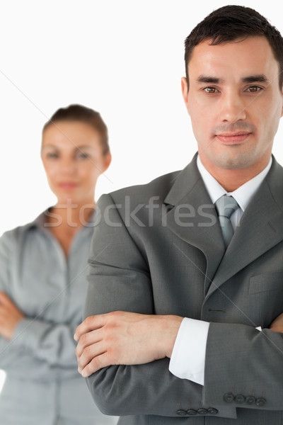 Close up of business partners with arms folded against a white abckground Stock photo © wavebreak_media