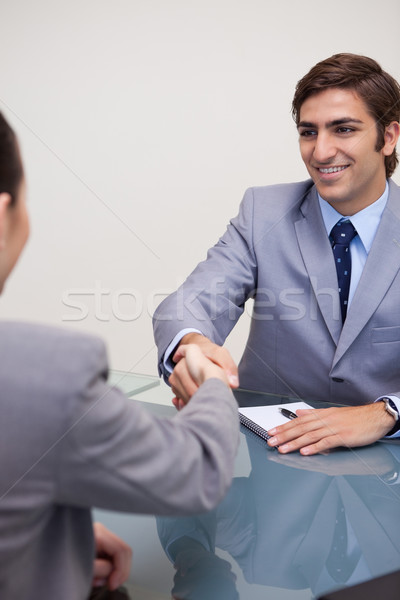 Jovem parceiros de negócios tratar negócio falante Foto stock © wavebreak_media