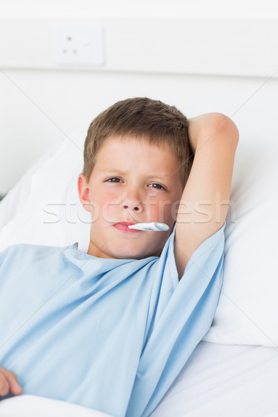 Băiat termometru gură portret bolnav Imagine de stoc © wavebreak_media