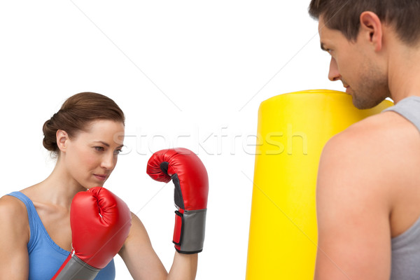 Determinado femenino boxeador centrado formación blanco Foto stock © wavebreak_media